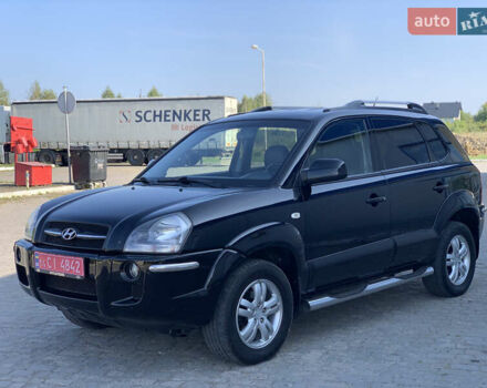 Черный Хендай Туксон, объемом двигателя 2 л и пробегом 220 тыс. км за 8700 $, фото 1 на Automoto.ua
