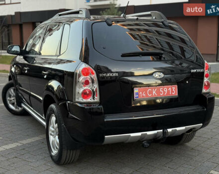 Чорний Хендай Туксон, об'ємом двигуна 2 л та пробігом 156 тис. км за 7850 $, фото 22 на Automoto.ua