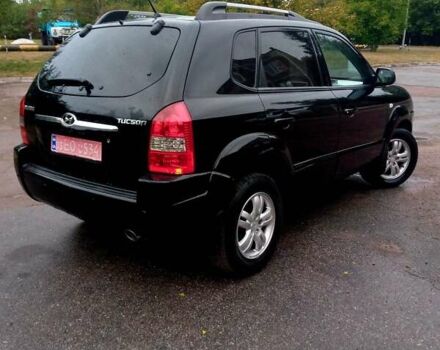 Чорний Хендай Туксон, об'ємом двигуна 2 л та пробігом 225 тис. км за 7850 $, фото 6 на Automoto.ua