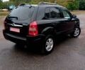 Чорний Хендай Туксон, об'ємом двигуна 2 л та пробігом 225 тис. км за 7850 $, фото 6 на Automoto.ua