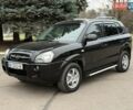 Черный Хендай Туксон, объемом двигателя 1.99 л и пробегом 240 тыс. км за 7200 $, фото 2 на Automoto.ua