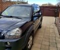 Чорний Хендай Туксон, об'ємом двигуна 2 л та пробігом 154 тис. км за 8700 $, фото 1 на Automoto.ua