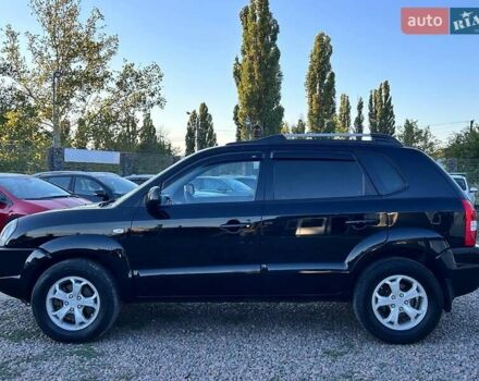 Черный Хендай Туксон, объемом двигателя 2 л и пробегом 230 тыс. км за 7500 $, фото 7 на Automoto.ua