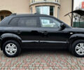 Чорний Хендай Туксон, об'ємом двигуна 2 л та пробігом 182 тис. км за 8299 $, фото 3 на Automoto.ua