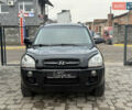 Чорний Хендай Туксон, об'ємом двигуна 2 л та пробігом 240 тис. км за 6888 $, фото 3 на Automoto.ua