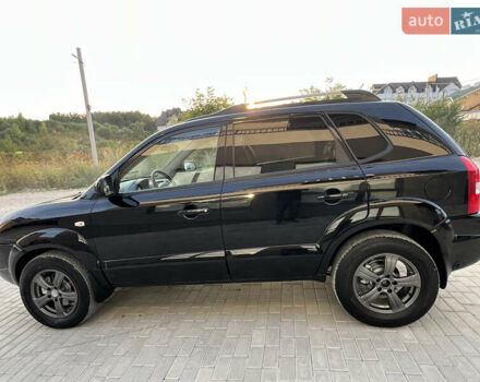 Чорний Хендай Туксон, об'ємом двигуна 1.98 л та пробігом 185 тис. км за 7199 $, фото 5 на Automoto.ua