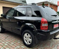 Чорний Хендай Туксон, об'ємом двигуна 2 л та пробігом 182 тис. км за 8299 $, фото 9 на Automoto.ua