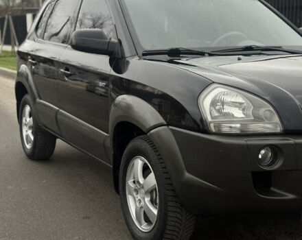 Чорний Хендай Туксон, об'ємом двигуна 2 л та пробігом 107 тис. км за 8500 $, фото 7 на Automoto.ua