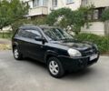 Черный Хендай Туксон, объемом двигателя 1.98 л и пробегом 269 тыс. км за 7800 $, фото 1 на Automoto.ua