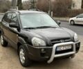 Черный Хендай Туксон, объемом двигателя 2 л и пробегом 270 тыс. км за 2500 $, фото 1 на Automoto.ua