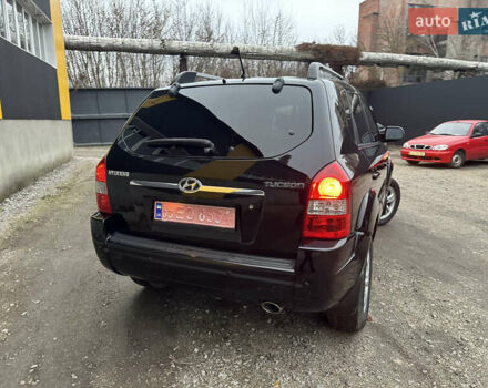 Чорний Хендай Туксон, об'ємом двигуна 2 л та пробігом 243 тис. км за 7999 $, фото 17 на Automoto.ua