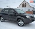 Чорний Хендай Туксон, об'ємом двигуна 1.98 л та пробігом 175 тис. км за 7700 $, фото 1 на Automoto.ua