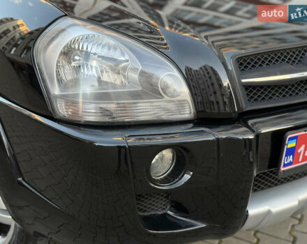 Чорний Хендай Туксон, об'ємом двигуна 2 л та пробігом 156 тис. км за 7850 $, фото 43 на Automoto.ua