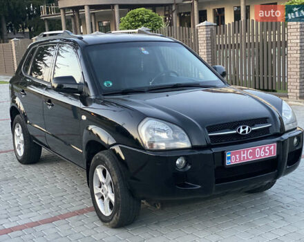Черный Хендай Туксон, объемом двигателя 2 л и пробегом 250 тыс. км за 7950 $, фото 42 на Automoto.ua