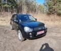 Черный Хендай Туксон, объемом двигателя 2 л и пробегом 236 тыс. км за 7850 $, фото 1 на Automoto.ua