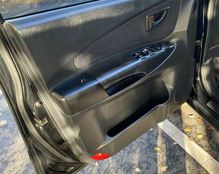 Черный Хендай Туксон, объемом двигателя 1.98 л и пробегом 218 тыс. км за 7200 $, фото 17 на Automoto.ua