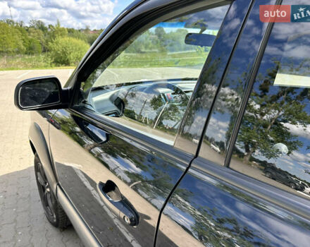 Чорний Хендай Туксон, об'ємом двигуна 1.98 л та пробігом 279 тис. км за 8200 $, фото 7 на Automoto.ua