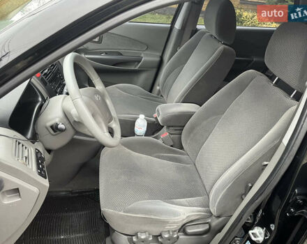 Черный Хендай Туксон, объемом двигателя 2 л и пробегом 107 тыс. км за 8900 $, фото 24 на Automoto.ua