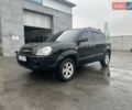 Черный Хендай Туксон, объемом двигателя 1.98 л и пробегом 173 тыс. км за 8800 $, фото 22 на Automoto.ua