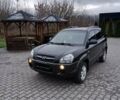 Черный Хендай Туксон, объемом двигателя 2 л и пробегом 230 тыс. км за 8000 $, фото 1 на Automoto.ua