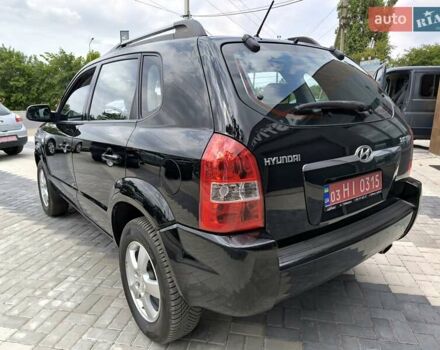 Черный Хендай Туксон, объемом двигателя 2 л и пробегом 137 тыс. км за 8400 $, фото 5 на Automoto.ua