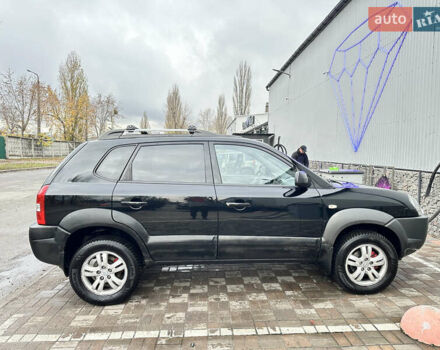 Чорний Хендай Туксон, об'ємом двигуна 2.66 л та пробігом 395 тис. км за 9950 $, фото 9 на Automoto.ua