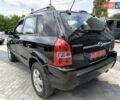 Черный Хендай Туксон, объемом двигателя 2 л и пробегом 137 тыс. км за 8400 $, фото 5 на Automoto.ua