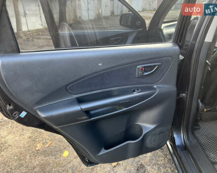 Чорний Хендай Туксон, об'ємом двигуна 2 л та пробігом 240 тис. км за 8500 $, фото 13 на Automoto.ua