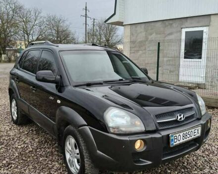 Чорний Хендай Туксон, об'ємом двигуна 2 л та пробігом 185 тис. км за 7499 $, фото 2 на Automoto.ua