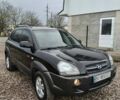 Чорний Хендай Туксон, об'ємом двигуна 2 л та пробігом 185 тис. км за 7499 $, фото 2 на Automoto.ua