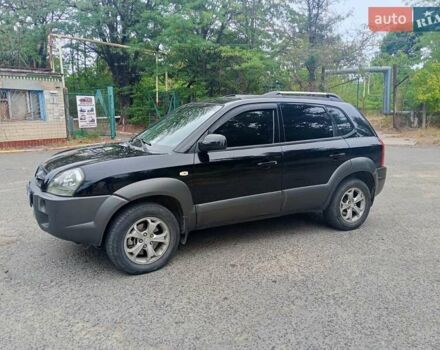 Черный Хендай Туксон, объемом двигателя 1.98 л и пробегом 157 тыс. км за 7500 $, фото 4 на Automoto.ua