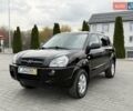 Чорний Хендай Туксон, об'ємом двигуна 1.98 л та пробігом 239 тис. км за 8600 $, фото 1 на Automoto.ua