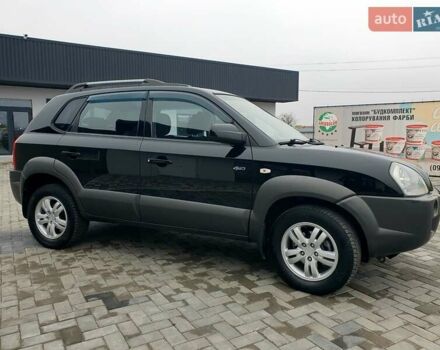 Чорний Хендай Туксон, об'ємом двигуна 2 л та пробігом 225 тис. км за 8000 $, фото 17 на Automoto.ua