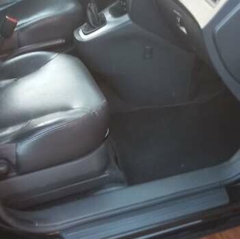 Черный Хендай Туксон, объемом двигателя 2 л и пробегом 187 тыс. км за 8800 $, фото 5 на Automoto.ua