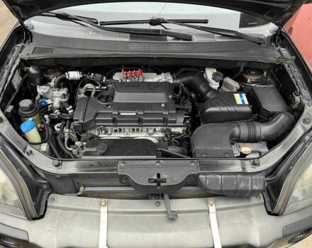 Черный Хендай Туксон, объемом двигателя 2 л и пробегом 270 тыс. км за 7600 $, фото 2 на Automoto.ua