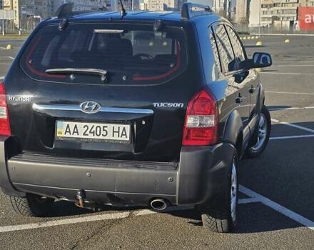Чорний Хендай Туксон, об'ємом двигуна 1.98 л та пробігом 212 тис. км за 7766 $, фото 4 на Automoto.ua