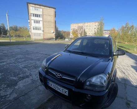 Черный Хендай Туксон, объемом двигателя 1.98 л и пробегом 262 тыс. км за 7900 $, фото 1 на Automoto.ua