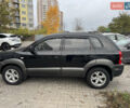 Черный Хендай Туксон, объемом двигателя 2 л и пробегом 157 тыс. км за 8900 $, фото 7 на Automoto.ua