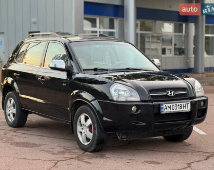 Черный Хендай Туксон, объемом двигателя 2 л и пробегом 361 тыс. км за 6499 $, фото 7 на Automoto.ua