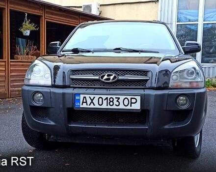 Чорний Хендай Туксон, об'ємом двигуна 2 л та пробігом 188 тис. км за 8800 $, фото 6 на Automoto.ua