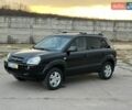 Черный Хендай Туксон, объемом двигателя 1.98 л и пробегом 167 тыс. км за 8300 $, фото 1 на Automoto.ua