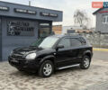 Чорний Хендай Туксон, об'ємом двигуна 2 л та пробігом 240 тис. км за 6888 $, фото 2 на Automoto.ua