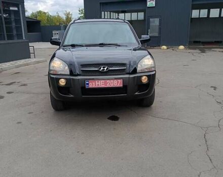 Черный Хендай Туксон, объемом двигателя 2 л и пробегом 255 тыс. км за 8700 $, фото 3 на Automoto.ua