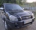 Черный Хендай Туксон, объемом двигателя 2 л и пробегом 197 тыс. км за 8000 $, фото 2 на Automoto.ua