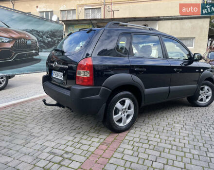 Черный Хендай Туксон, объемом двигателя 1.98 л и пробегом 177 тыс. км за 7600 $, фото 8 на Automoto.ua