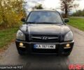 Черный Хендай Туксон, объемом двигателя 2 л и пробегом 220 тыс. км за 8000 $, фото 2 на Automoto.ua