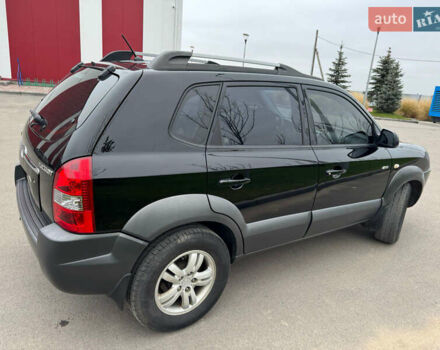 Чорний Хендай Туксон, об'ємом двигуна 1.98 л та пробігом 156 тис. км за 9200 $, фото 1 на Automoto.ua