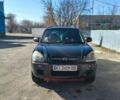 Черный Хендай Туксон, объемом двигателя 2 л и пробегом 280 тыс. км за 6200 $, фото 1 на Automoto.ua