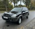 Чорний Хендай Туксон, об'ємом двигуна 2 л та пробігом 168 тис. км за 8200 $, фото 2 на Automoto.ua