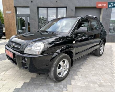 Черный Хендай Туксон, объемом двигателя 2 л и пробегом 137 тыс. км за 8400 $, фото 7 на Automoto.ua